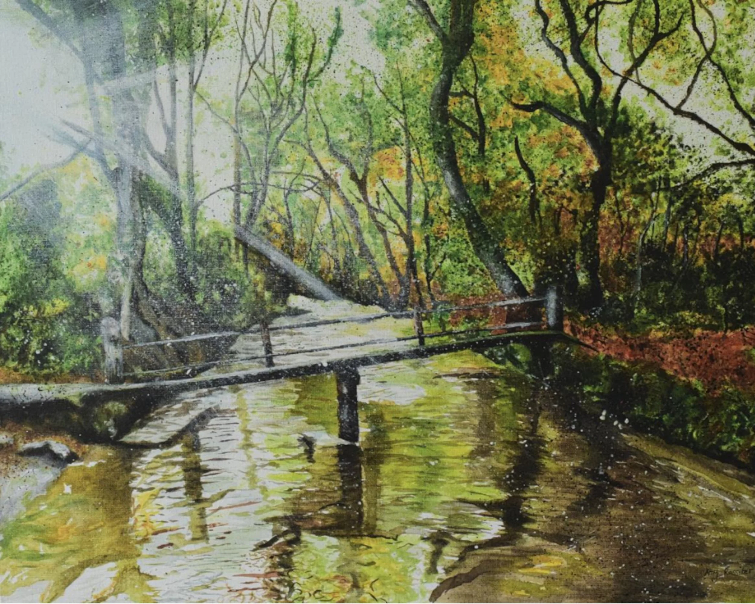 Watercolor painting of a wooded area with a small bridge over a creek, surrounded by trees with autumn foliage.