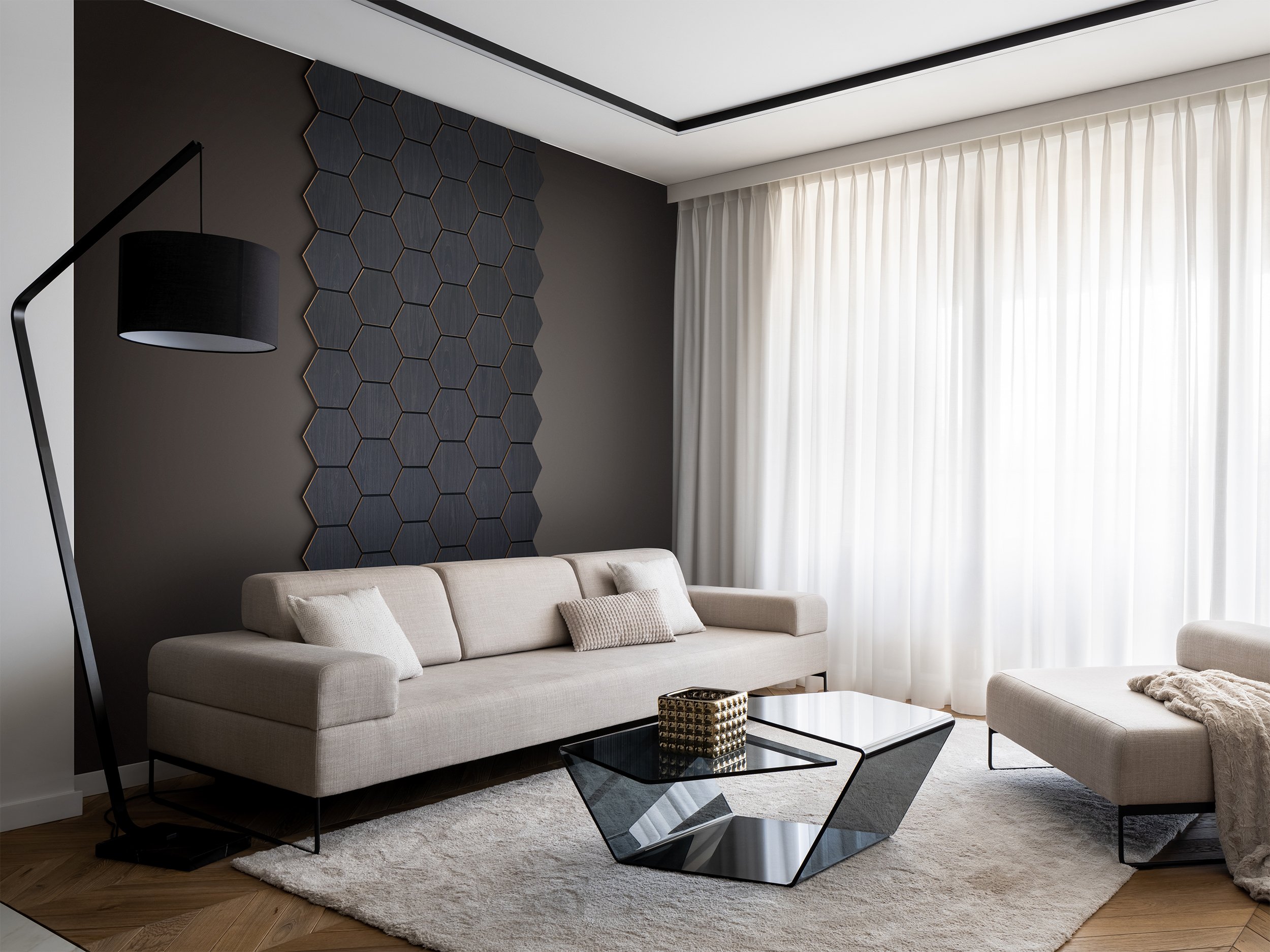 Hex Panel in Charcoal Oak used as a feature behind a couch