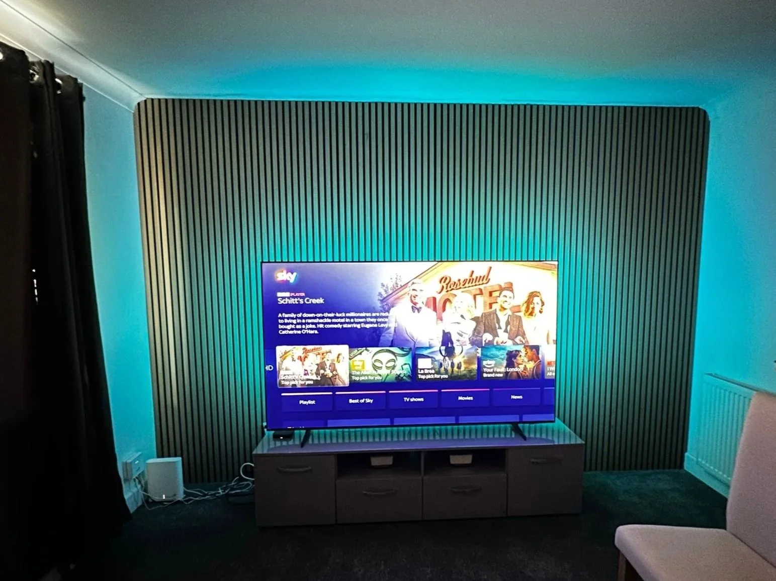 Acoustic Panels installed behind a TV with back lighting on the Isle Of Wight