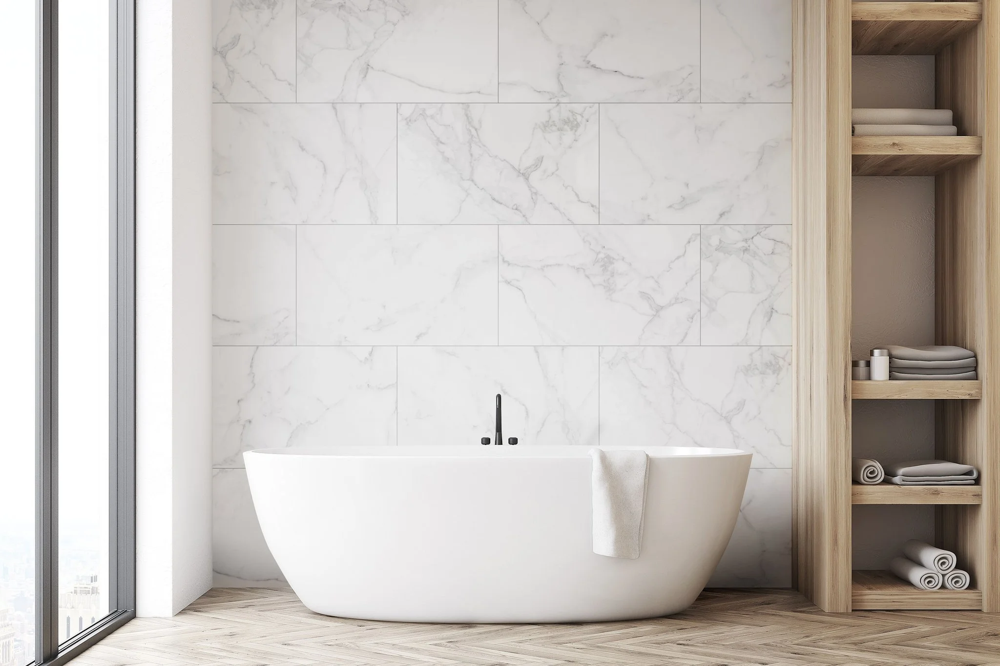 Easy Tile panels in Calacatta installed in a bathroom with a bath in front of them