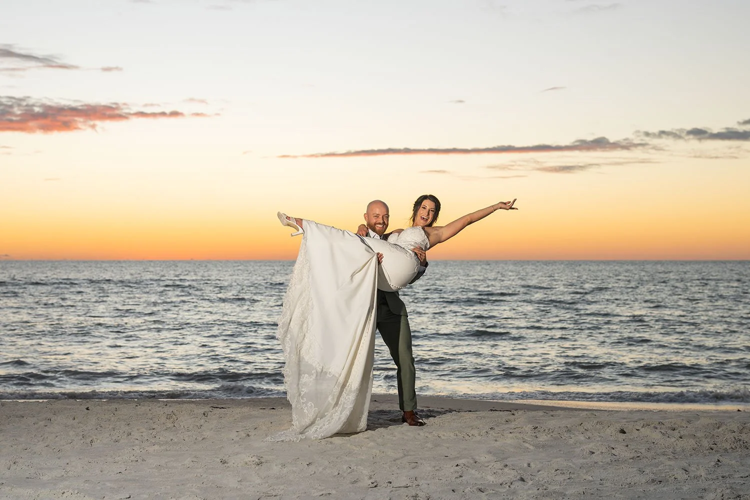 Bride and groom sunset portrait Naples Florida beach Naples wedding photographer sunset beach portraits Romantic Gulf of Mexico sunset wedding photo