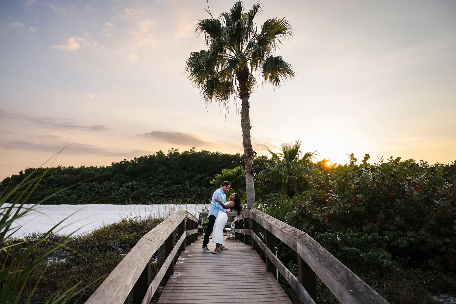 Farah and Craig's surprise proposal and engagement photos at Tigertail Beach on Marco Island, Florida featuring sunset beach portraits and tropical scenery.