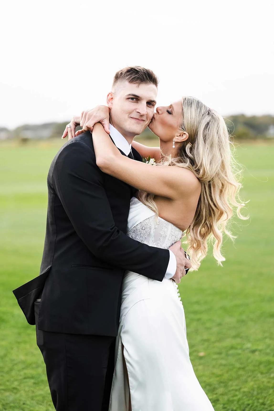 Bride Kissing Groom - Wedding Photographer Naples FL