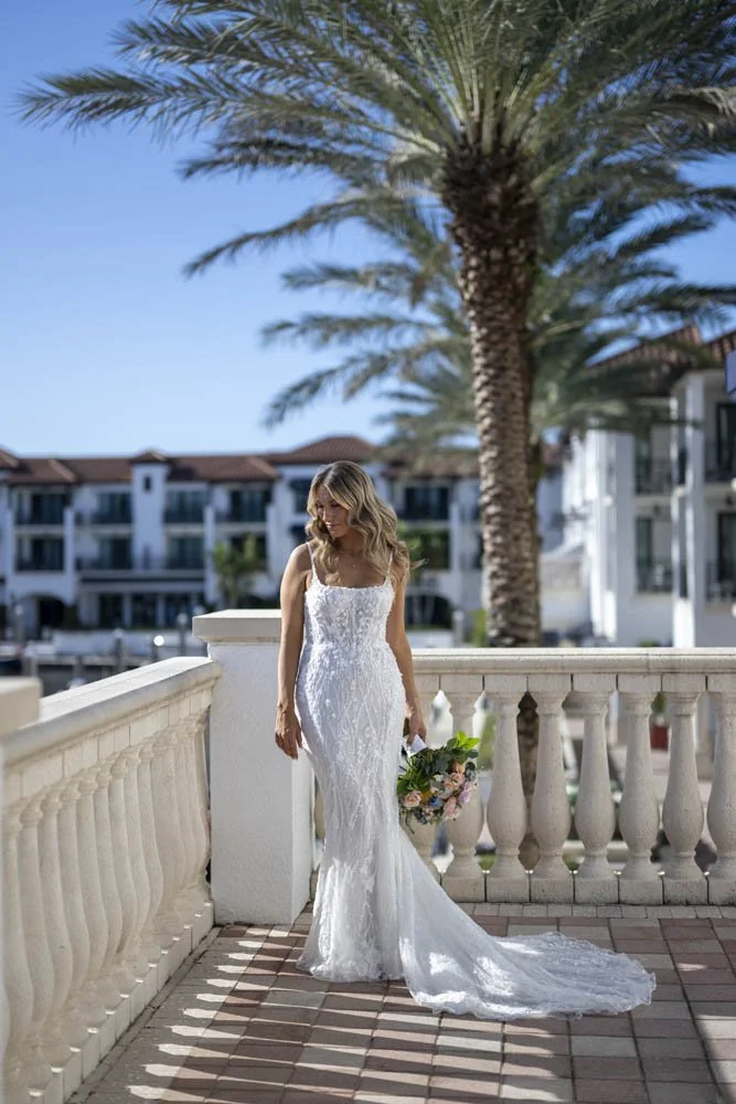 Bride with Champagne on balcony