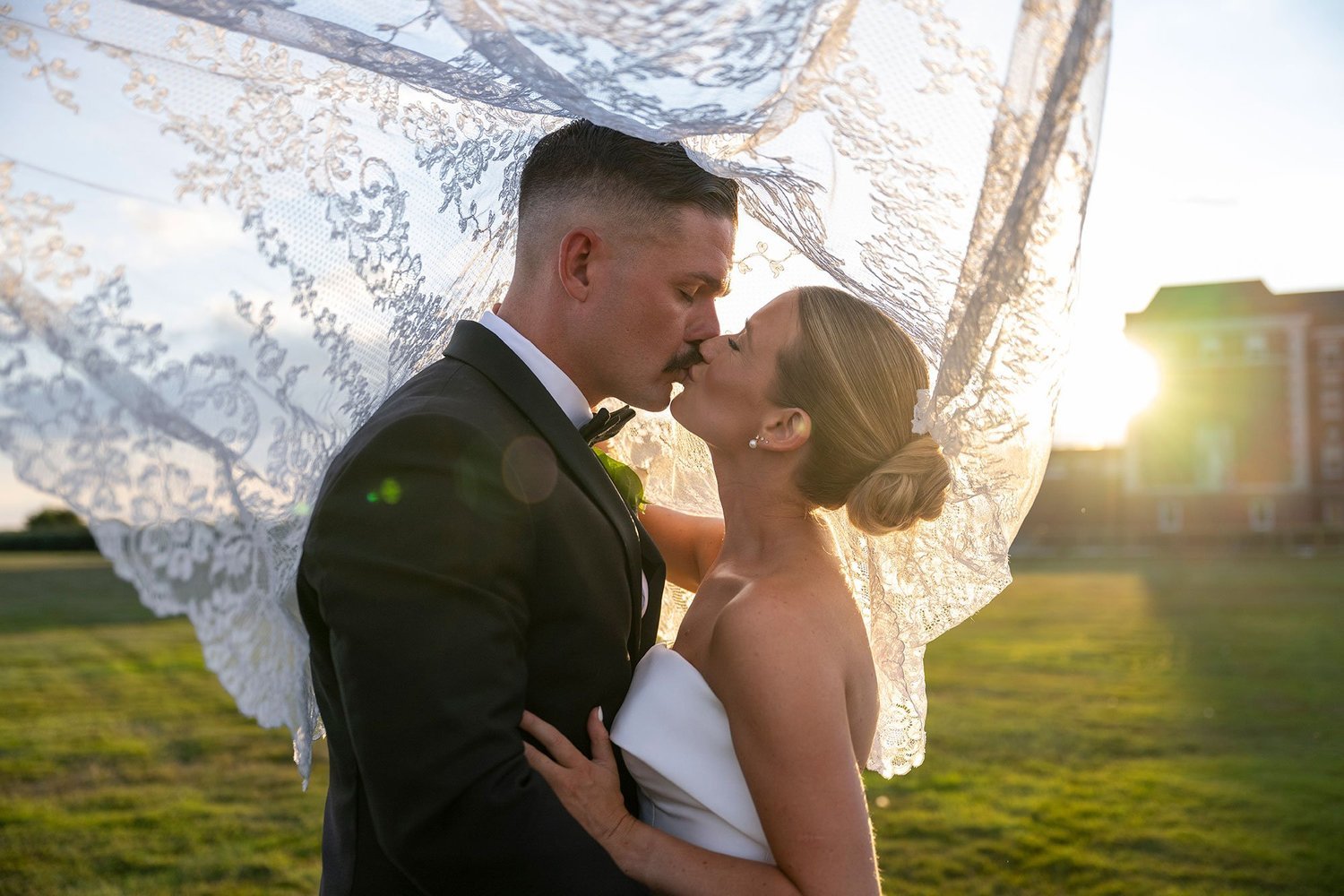 Bride and Groom Under Veil naples wedding photographer