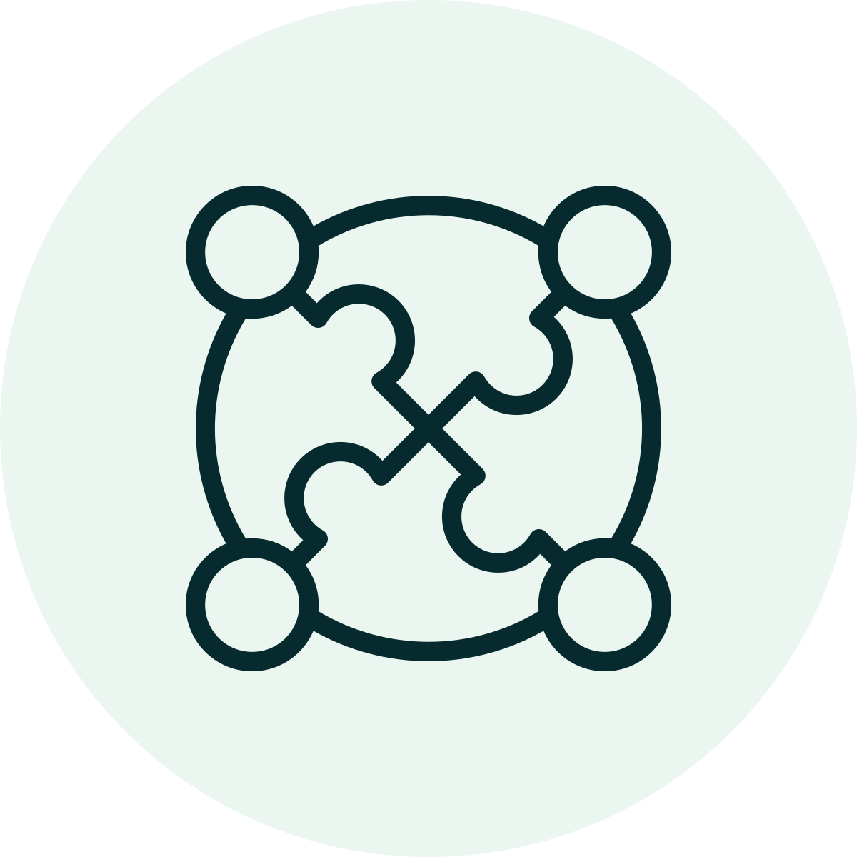 Icon of four interconnected puzzle pieces forming a square with four small circles at each corner.