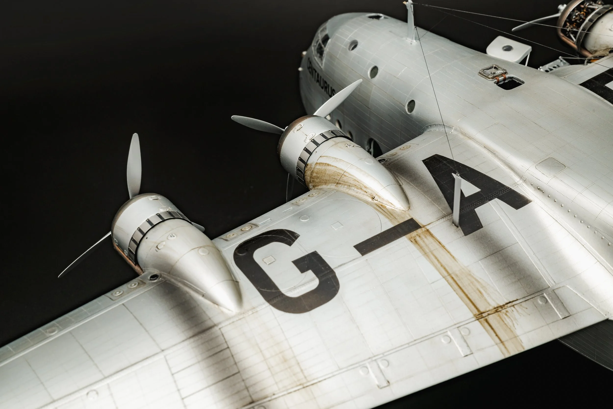 Short Empire flying boat model left wing with exhaust stains and an oil leak on the inboard engine