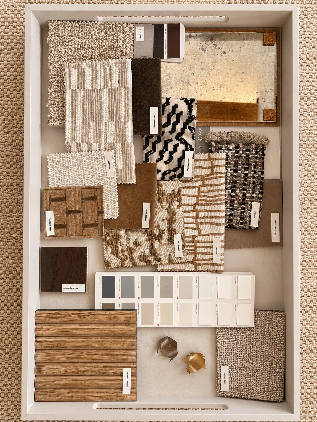 A closer look at the design process.

Layering textures, balancing tones and refining every detail to create schemes that feel both timeless and personal.

It's often these quieter moments, selecting materials, reviewing samples and curating palettes
