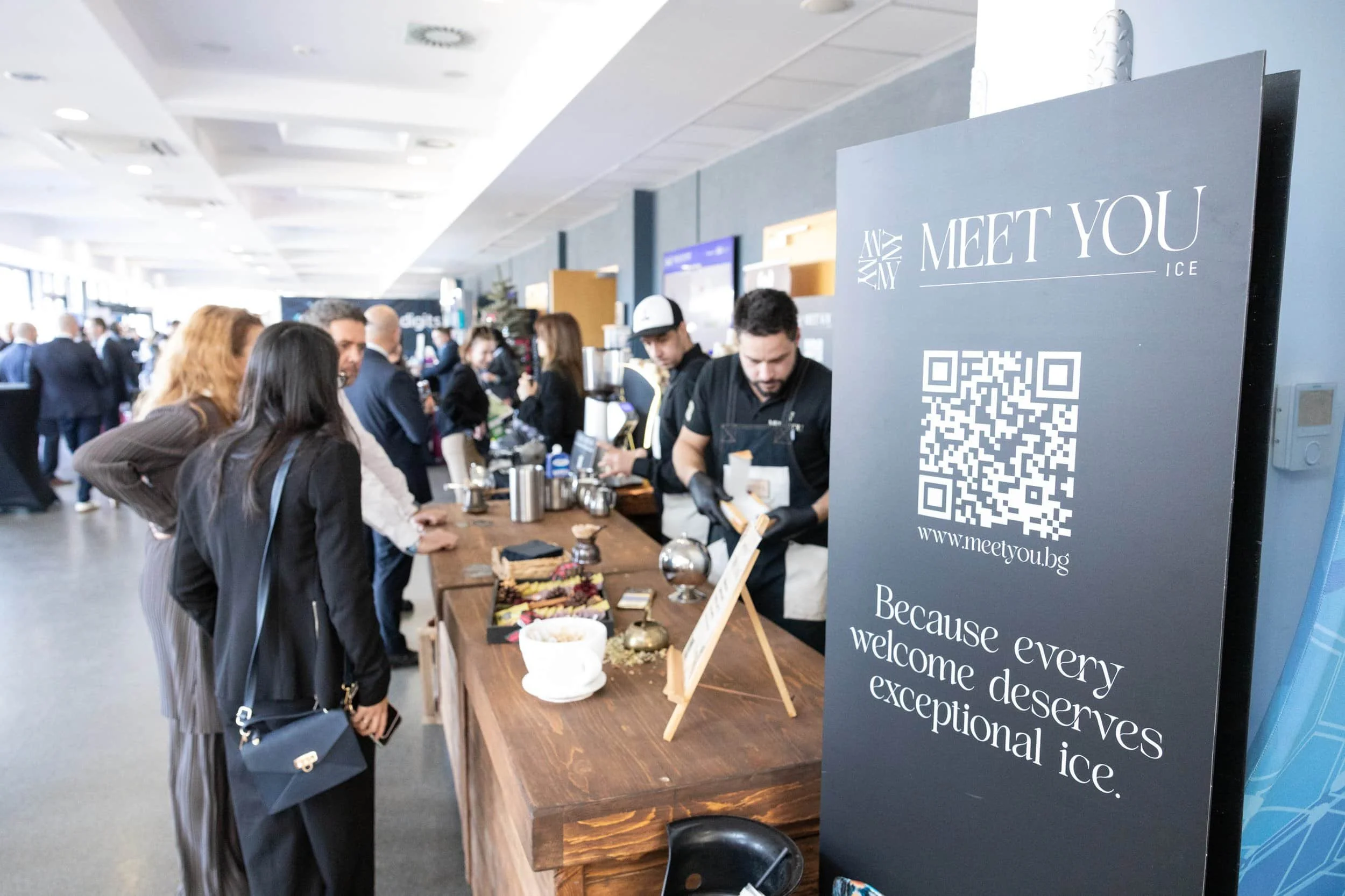 Guests visiting an exhibitor area at Powers Summit 2025 in Sofia
