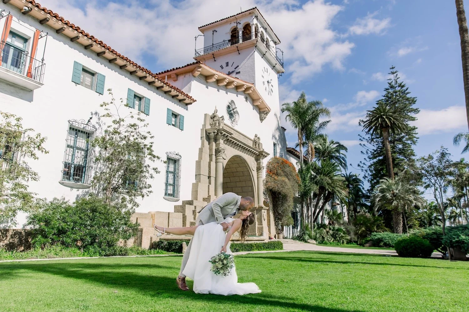 Elopement couple posing at historic Santa Barbara building