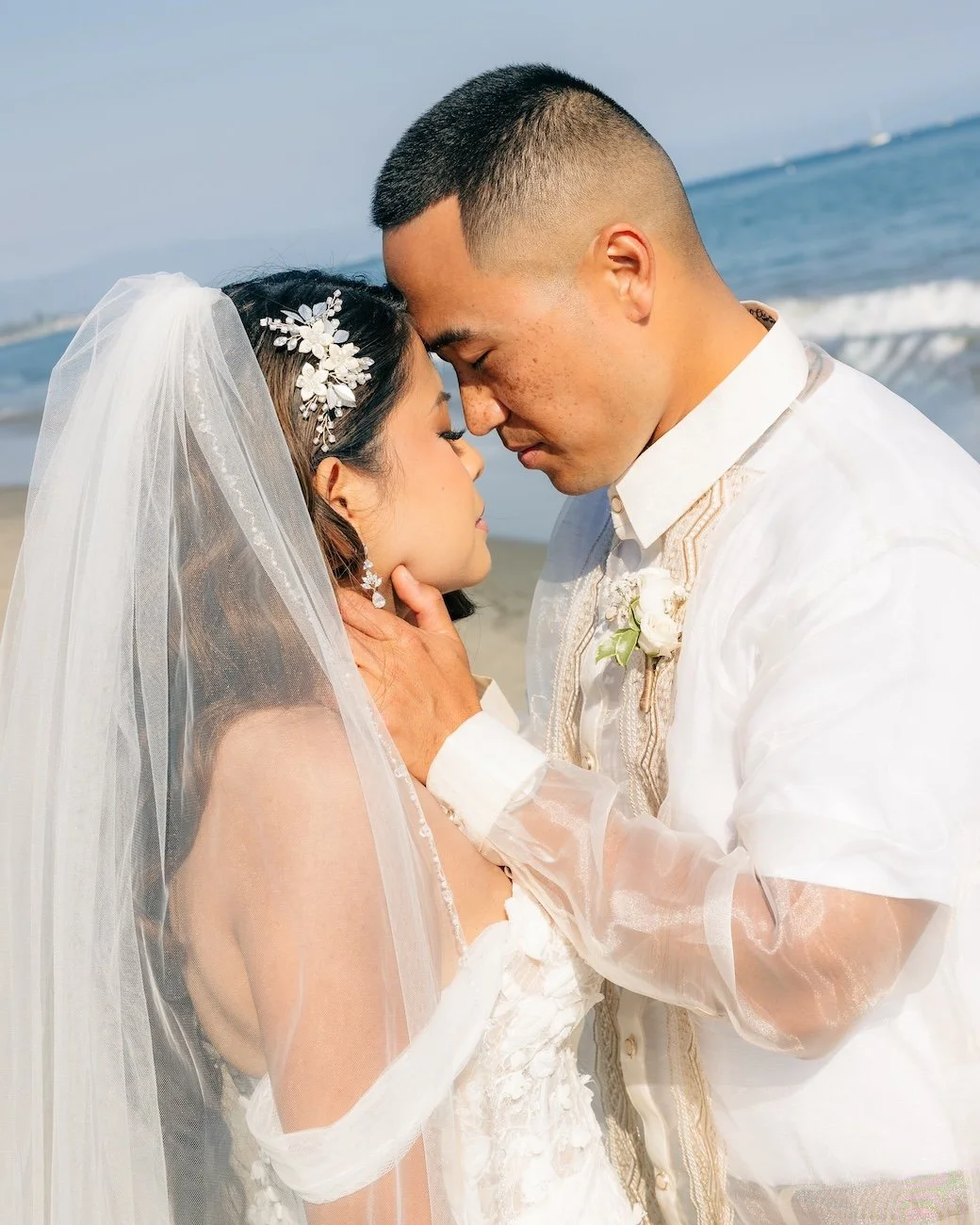 Elopement photography of couple at East Beach