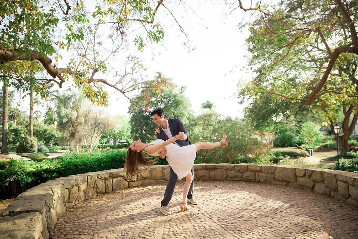 Newlyweds dancing in Alice Keck Gardens
