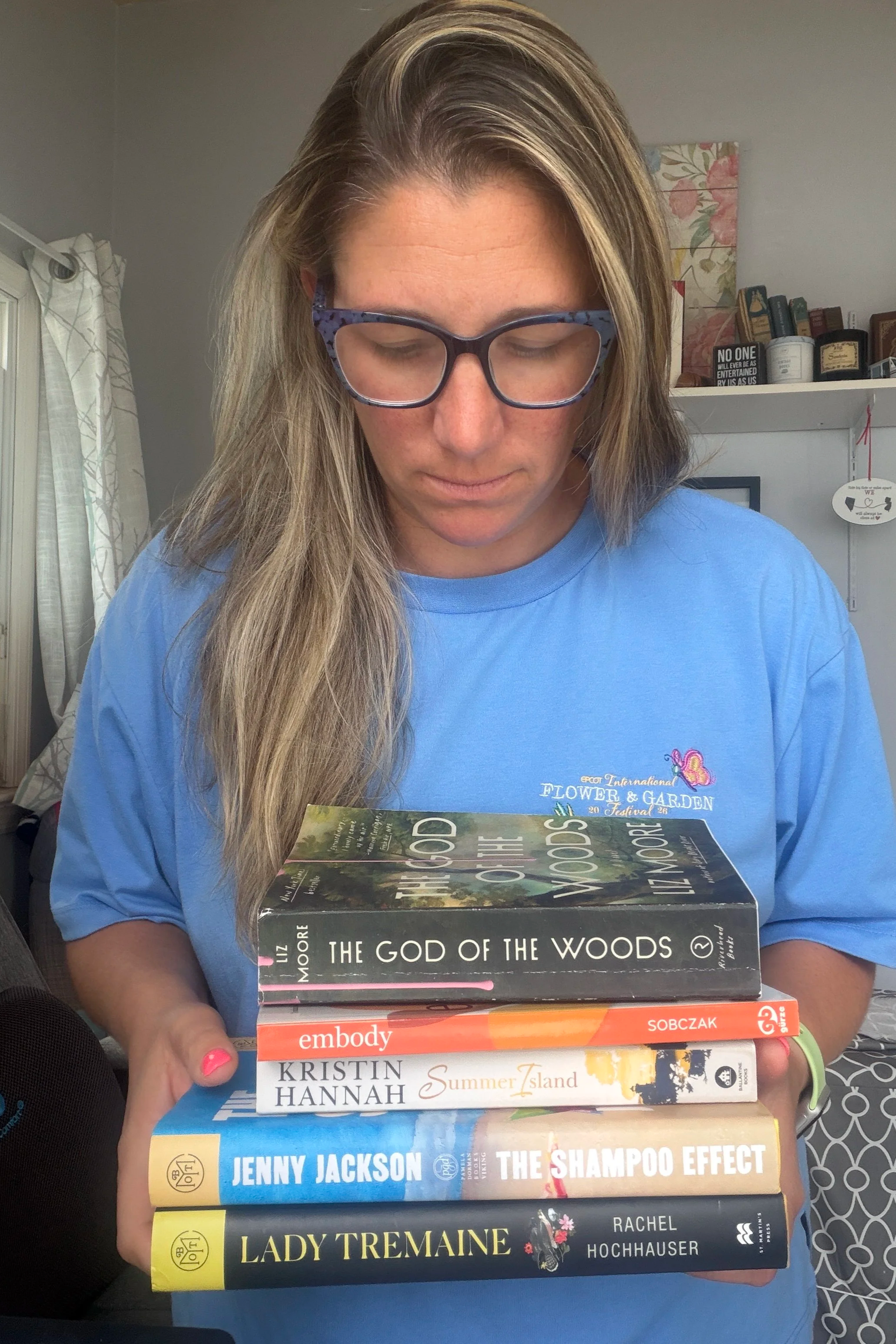 woman holding books