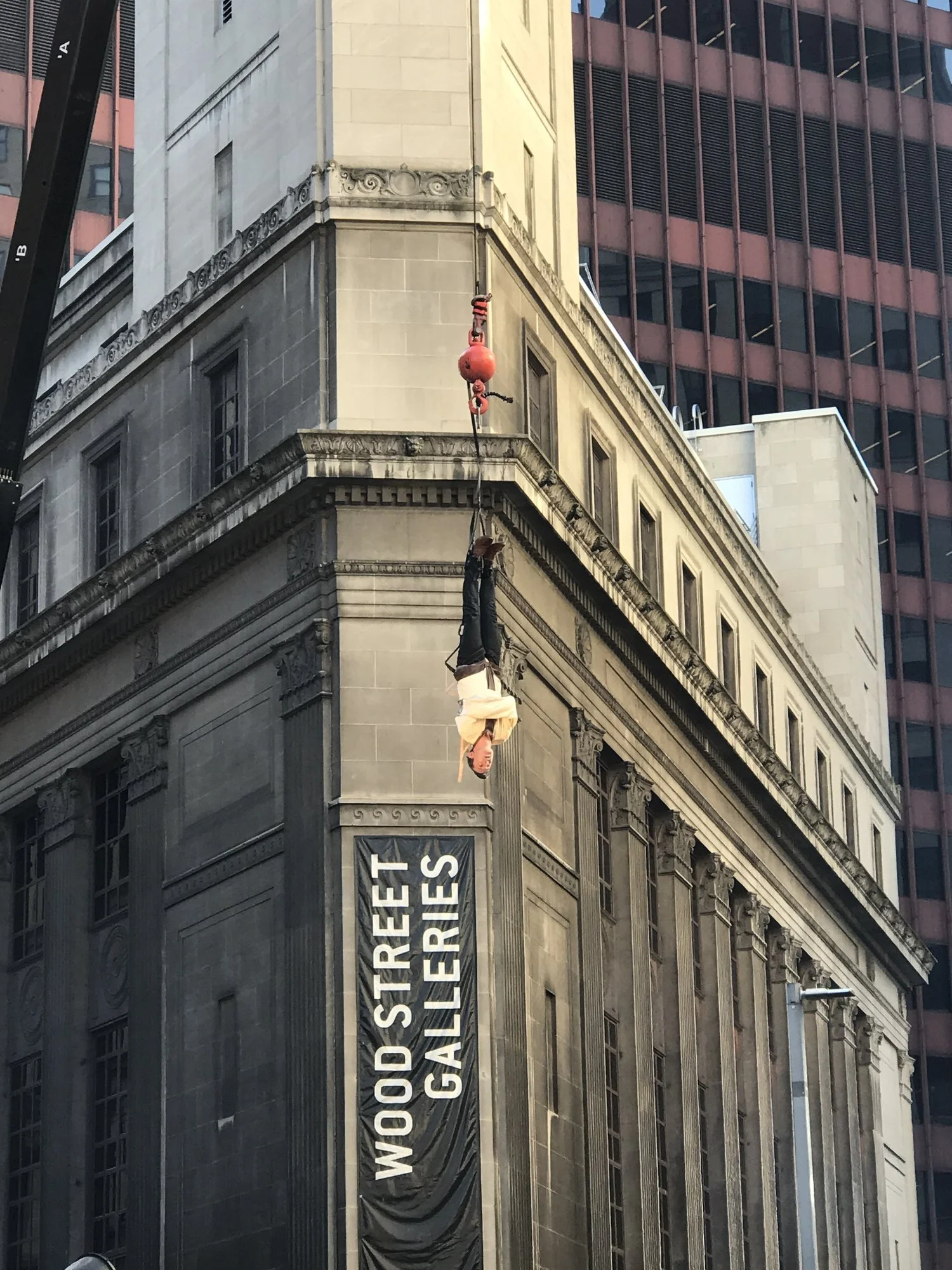 Lee Terbosic suspended above Wood Street during the original Houdini 100 escape