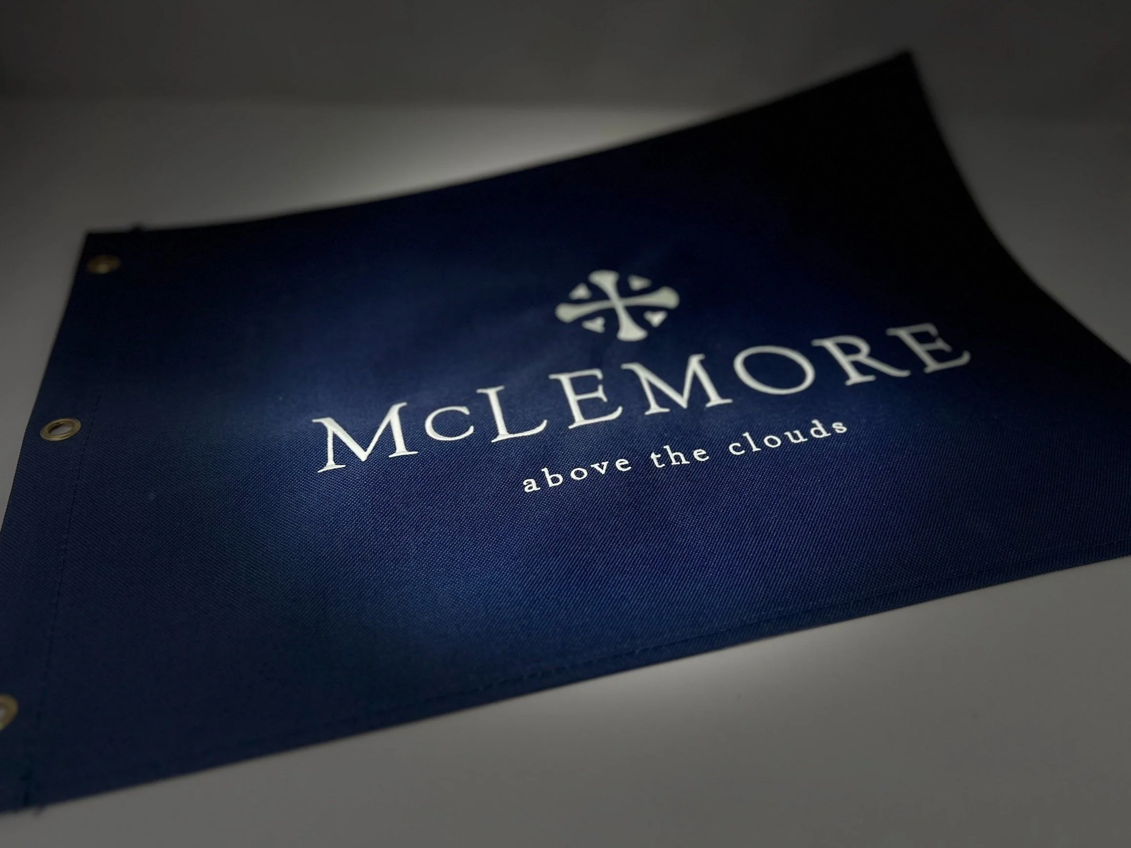 McLemore Resort branded golf flag on mountaintop course
