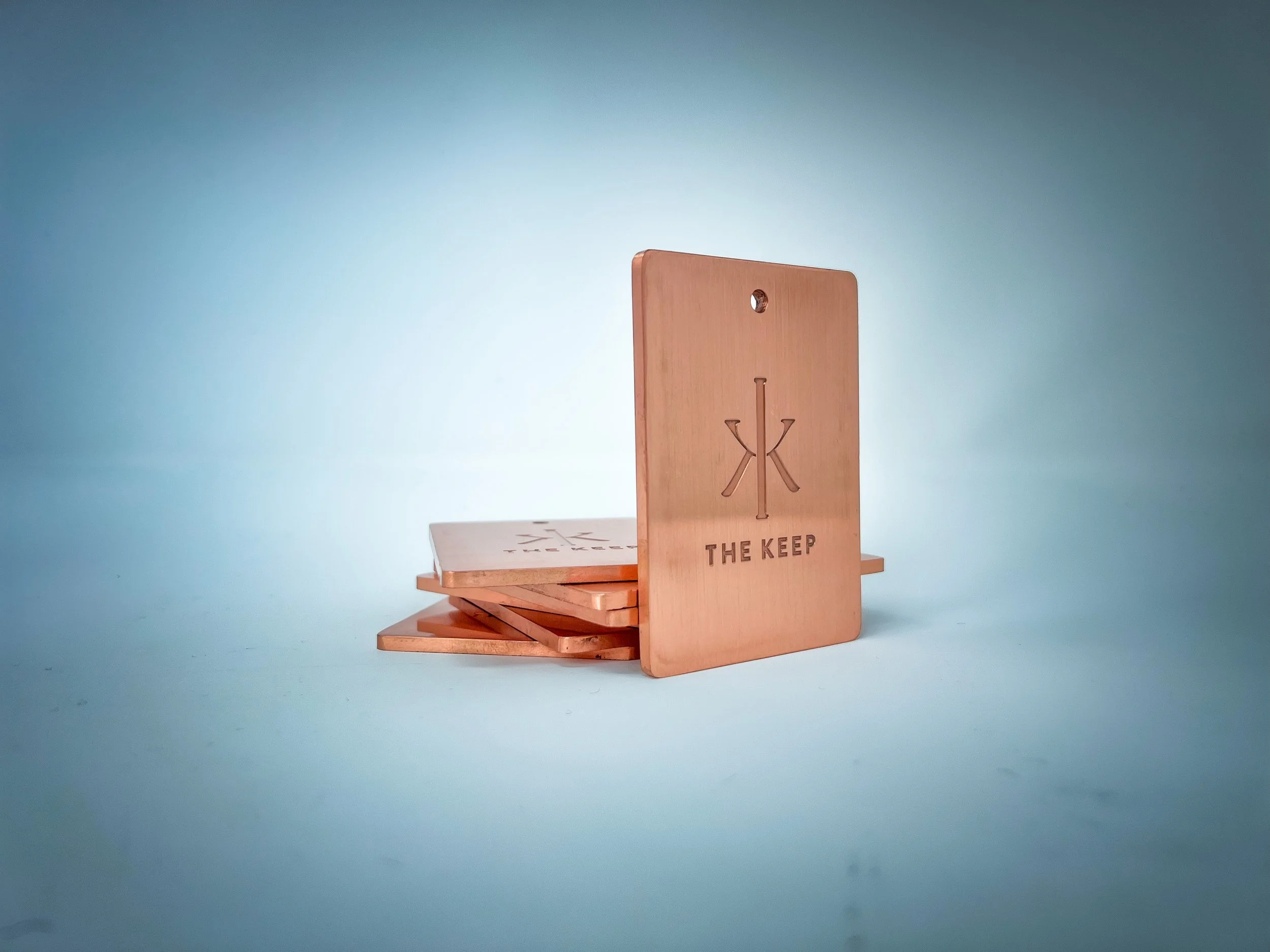 The Keep exclusive 8-ounce copper member bag tag with debossed icon