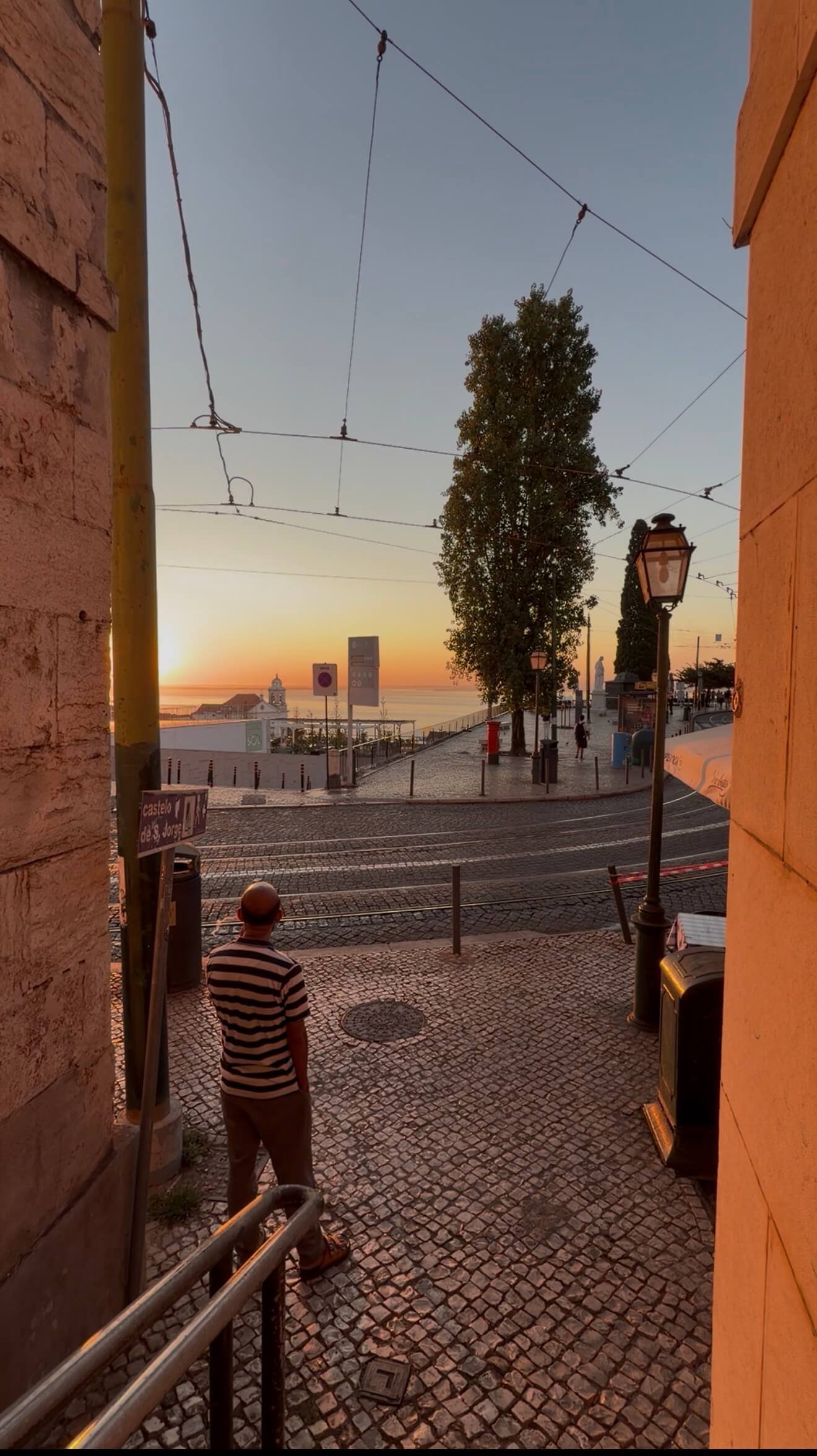Man Smoking Sunrise Lisbon Portugal.jpeg