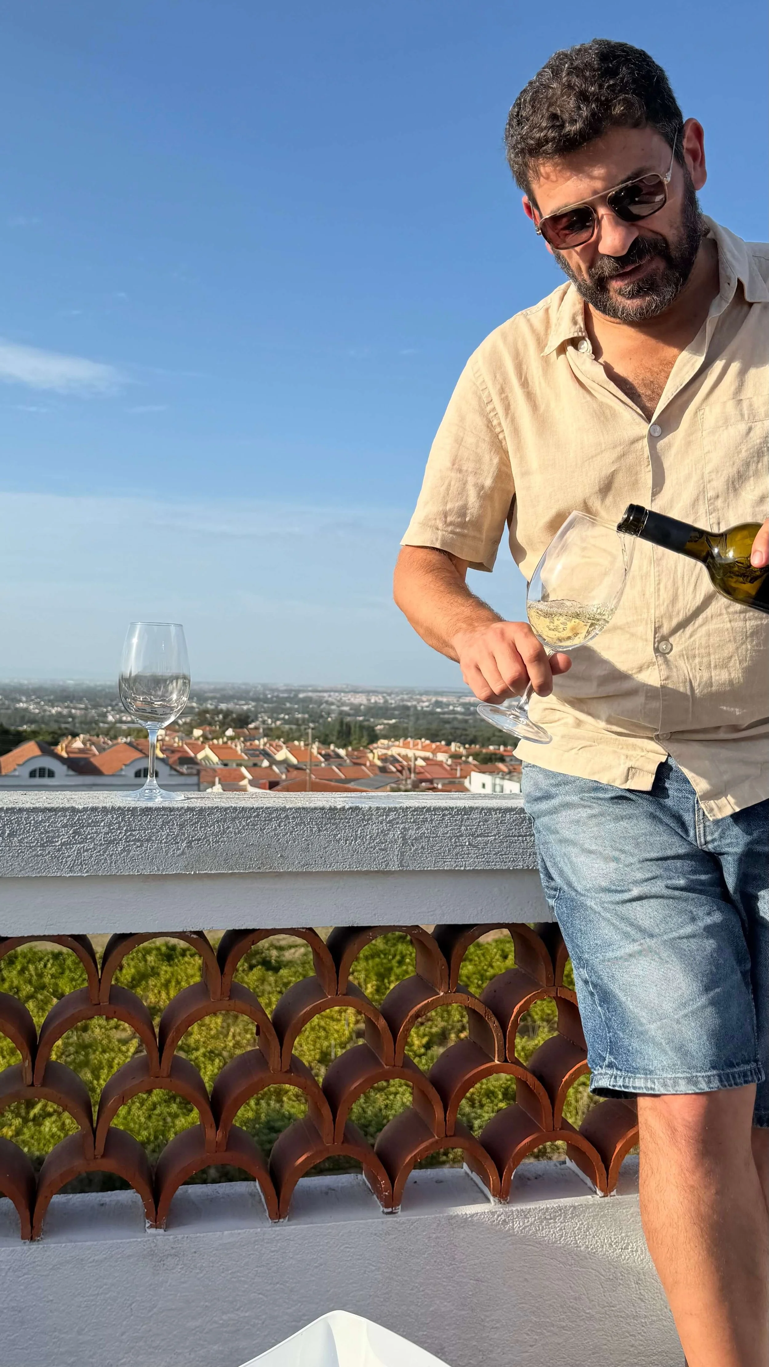 Man Pouring Wine Palmela Portugal.jpeg
