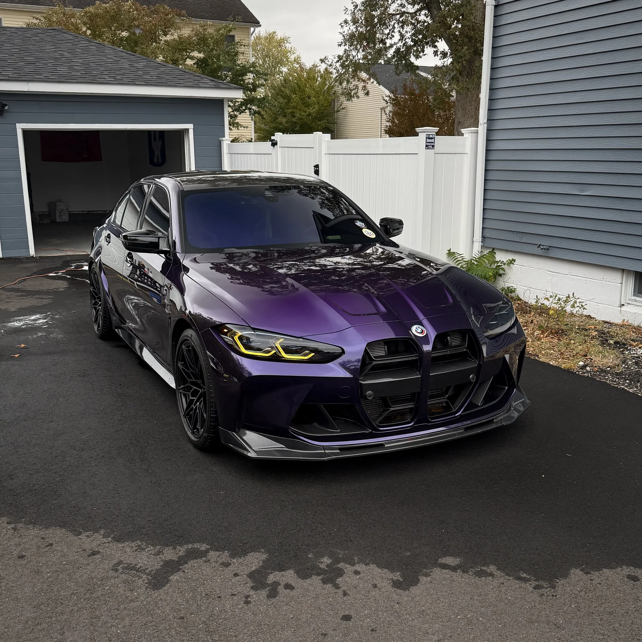 A shiny Purple BMW M3 Ceramic Coated in Monmouth County
