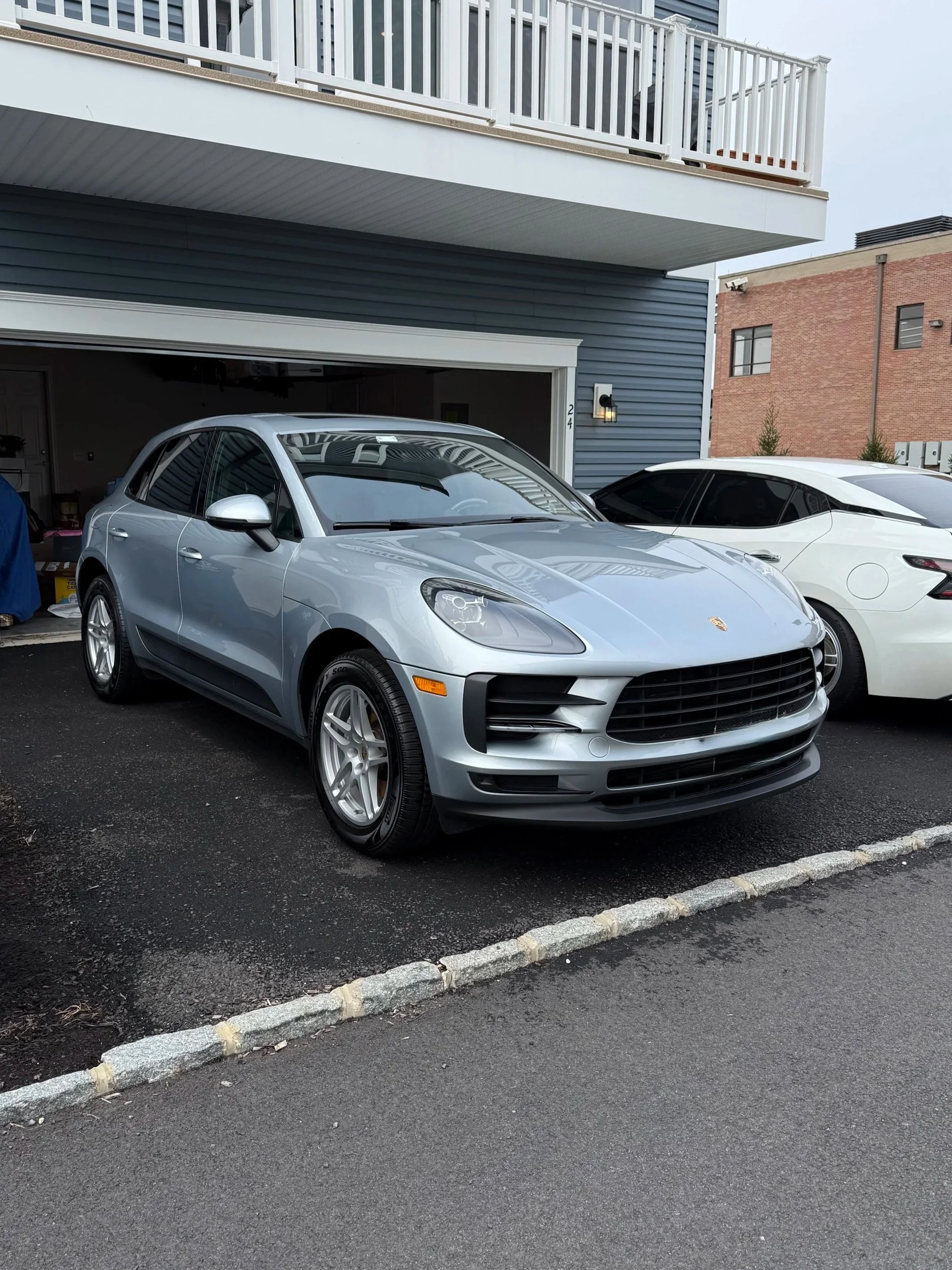 Luxury exterior detailing highlighting paint-safe wash, trim cleaning, and tire shine in Red Bank, NJ.
