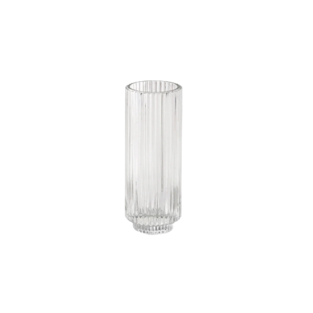 A clear, tall, ribbed glass vase.