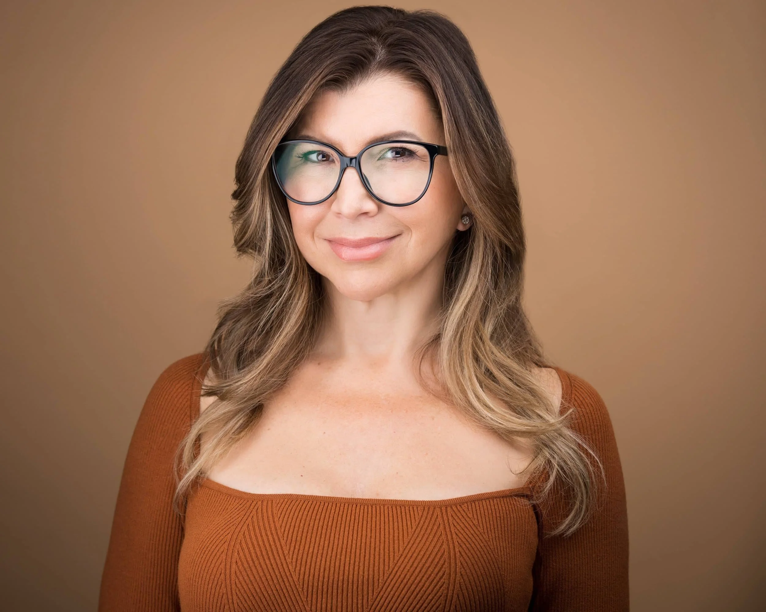 Executive headshot of a woman in professional attire — wardrobe example for a Vancouver headshot session