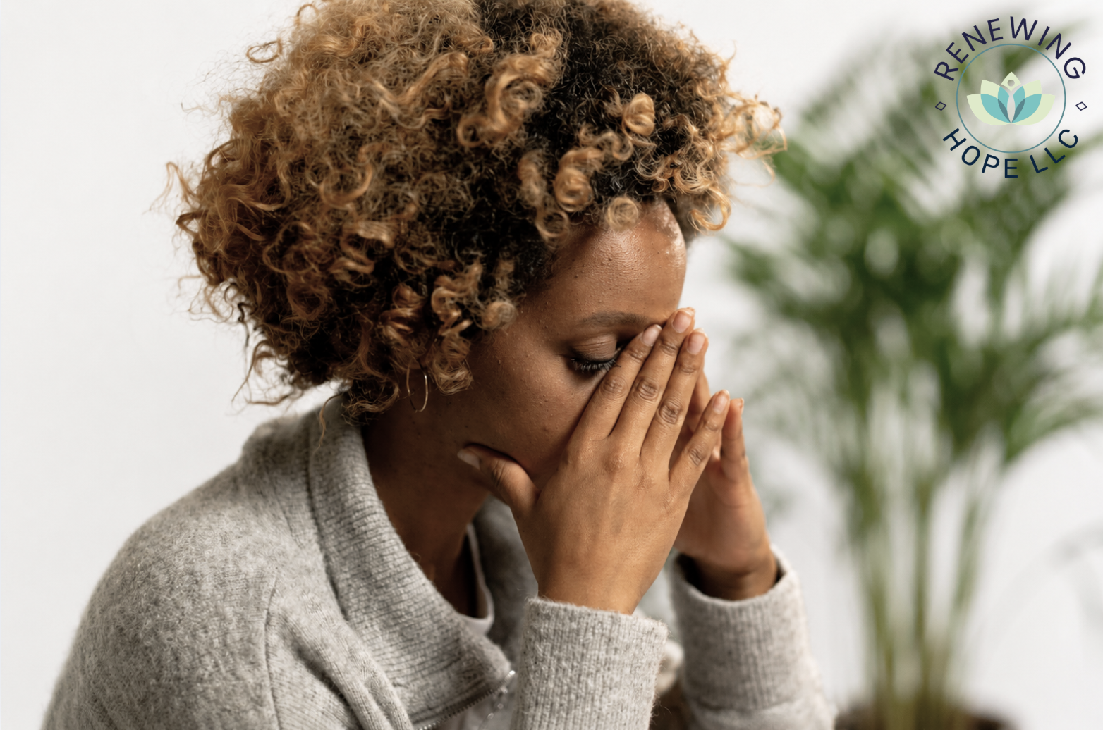 Woman experiencing emotional distress and depression, representing mental health counseling services at Renewing Hope LLC.