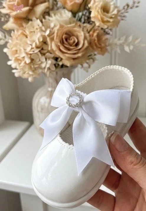 White Hard Sole Shoe With White Diamante Bow