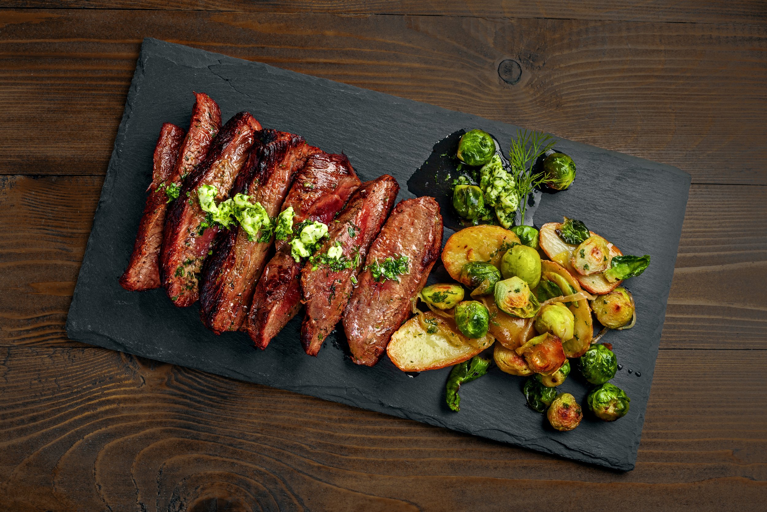 Hanger Steak with potatoes, brussels sprouts and onion