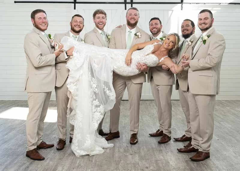 Bride and groomsmen photographed at a Columbia, SC wedding by VYZION Photography.