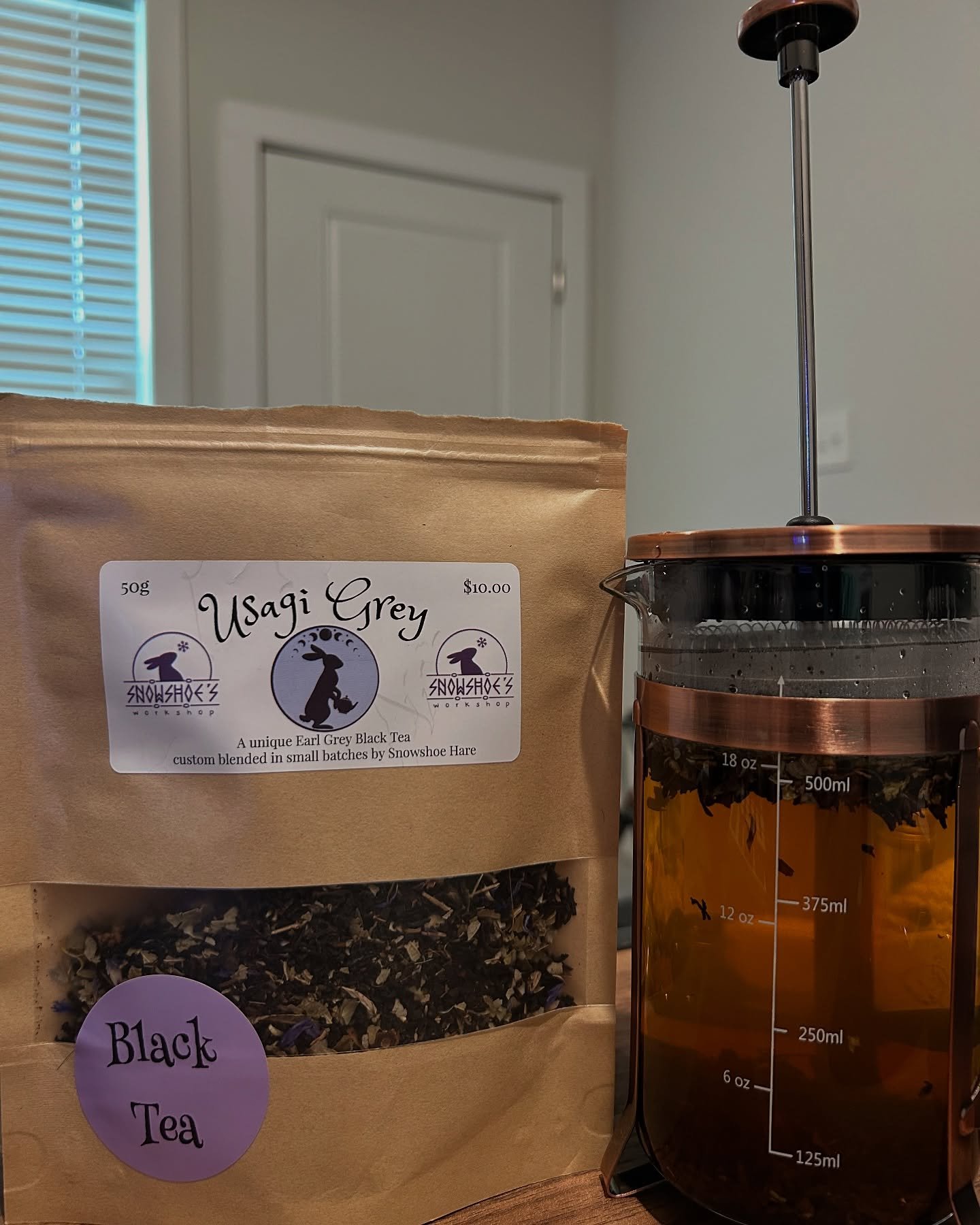 I had two cups of this wonderful Usagi Grey tea iced while I was doing readings yesterday at @madamemeerkat and I loved it so much that I brought a bag home with me! Snowshoe over at @snowshoesworkshop knows her tea and you can try a cup hot or iced