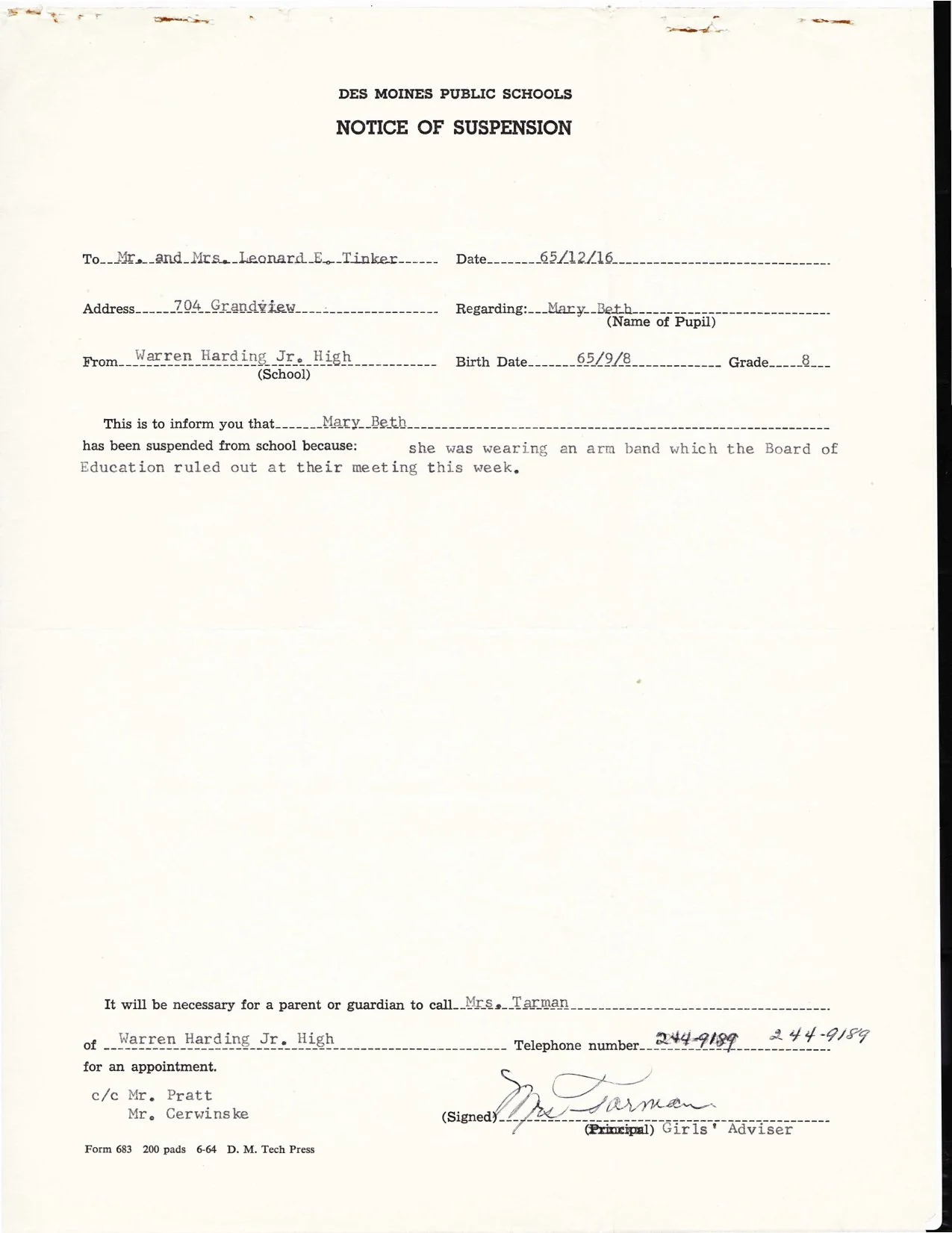 School suspension notice for Mary Beth Tinker, listing reason as wearing an arm band that the Board of Education ruled out