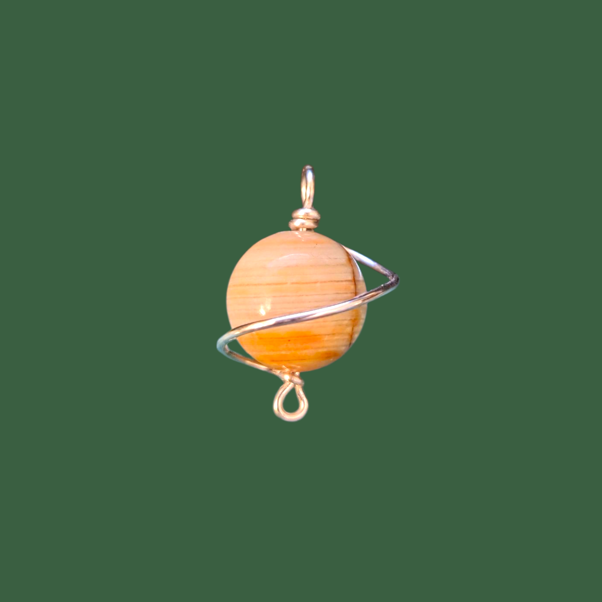 Pendant with a spherical wooden bead surrounded by a metal wire spiral