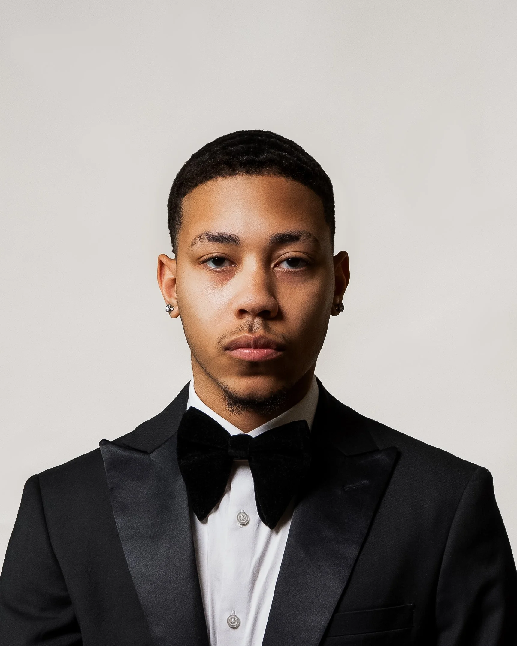 Close-up portrait of Santino Castillo, a photographer based in Syracuse, New York.