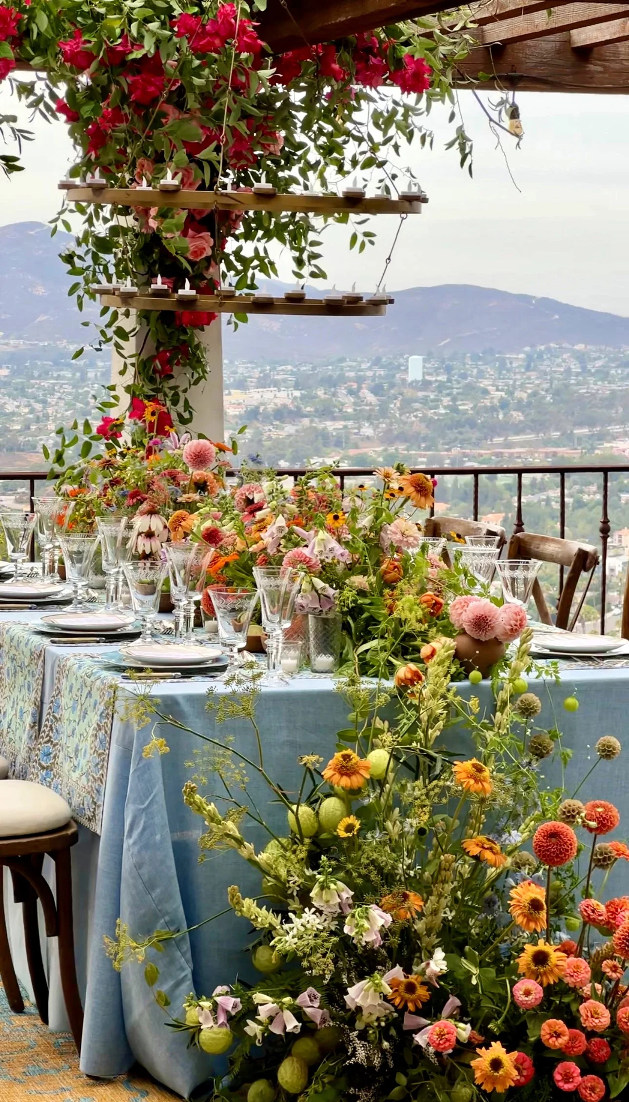 Intimate, ten person wedding celebration in San Diego with colorful florals captured by san diego wedding content creator who captures behind-the-scenes wedding videos.