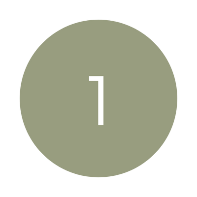A round medal with the number 1 in the center, colored greenish.