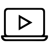 Silhouette of a person standing on a mountain peak at sunset, with a dog beside them.