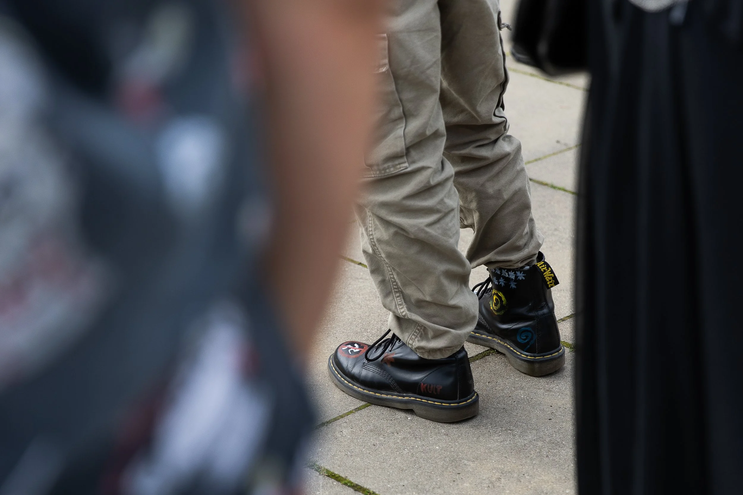 Shoes of a participant of the "Stop Fascism" demonstration, Solidarity Square, Szczecin, Poland, July 27, 2025