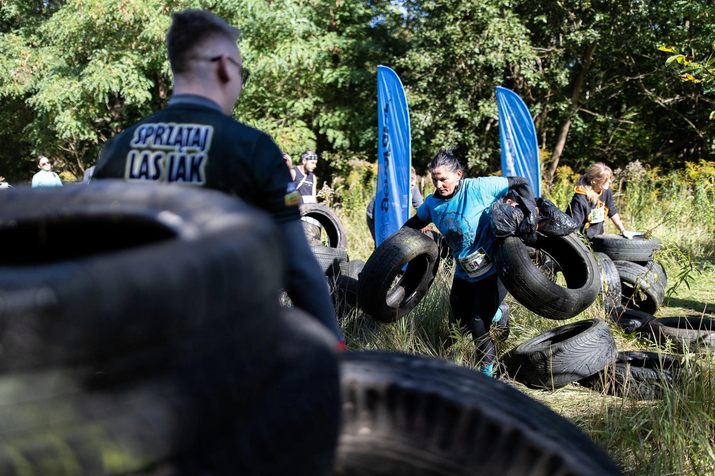 Participants in Trashmageddon – an event focused on cleanup and competition. Former motocross track, al. Wojska Polskiego 237A, Szczecin, Poland, September 27, 2025