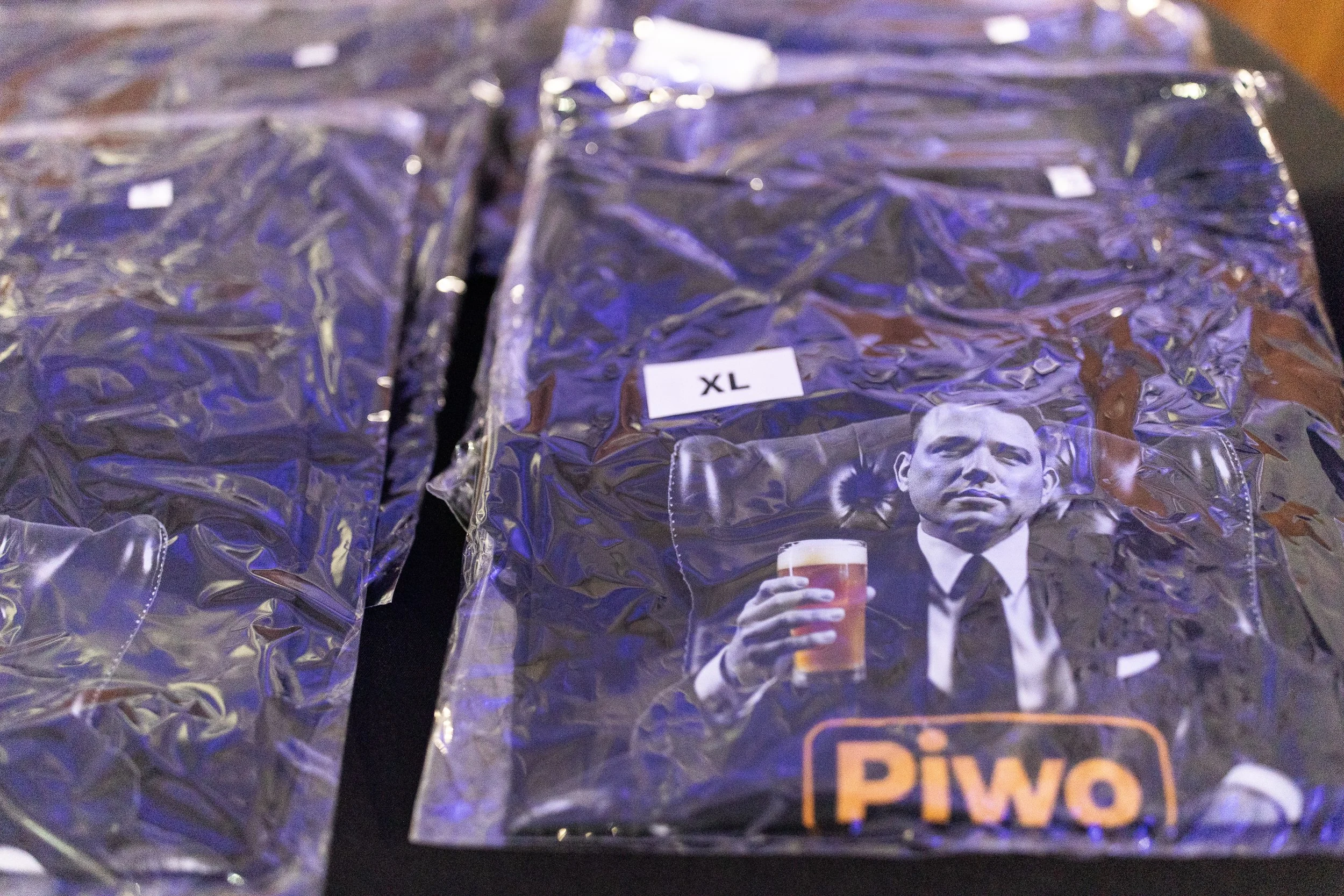 T-shirts of the co-chairman of the "Konfederacja" group Sławomir Mentzen sold during the "Beer with Mentzen" event, Event Arena, Szczecin, Poland, September 19, 2025