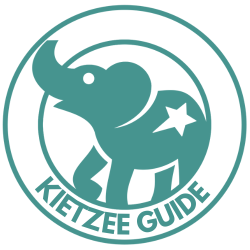 Kiezee Guide logo featuring a stylized elephant with a star on its side, inside a circular outline.