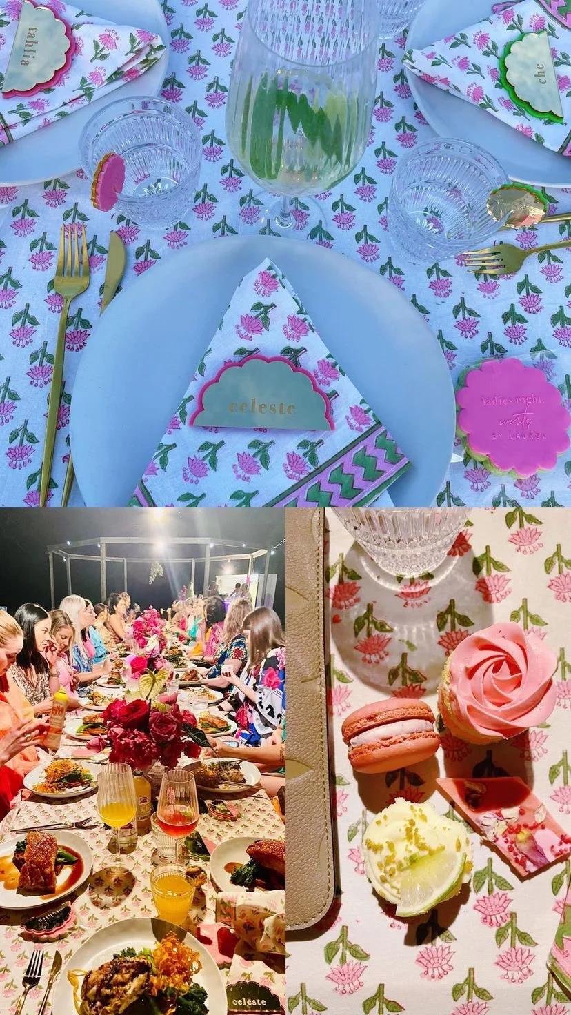A table welcoming guests with a floral tablecloth, plates, glasses, gold cutlery, and decorative napkins with names and personalized tags. A dining scene with women at a banquet, with floral centerpieces and drinks. Close-up of desserts including mac