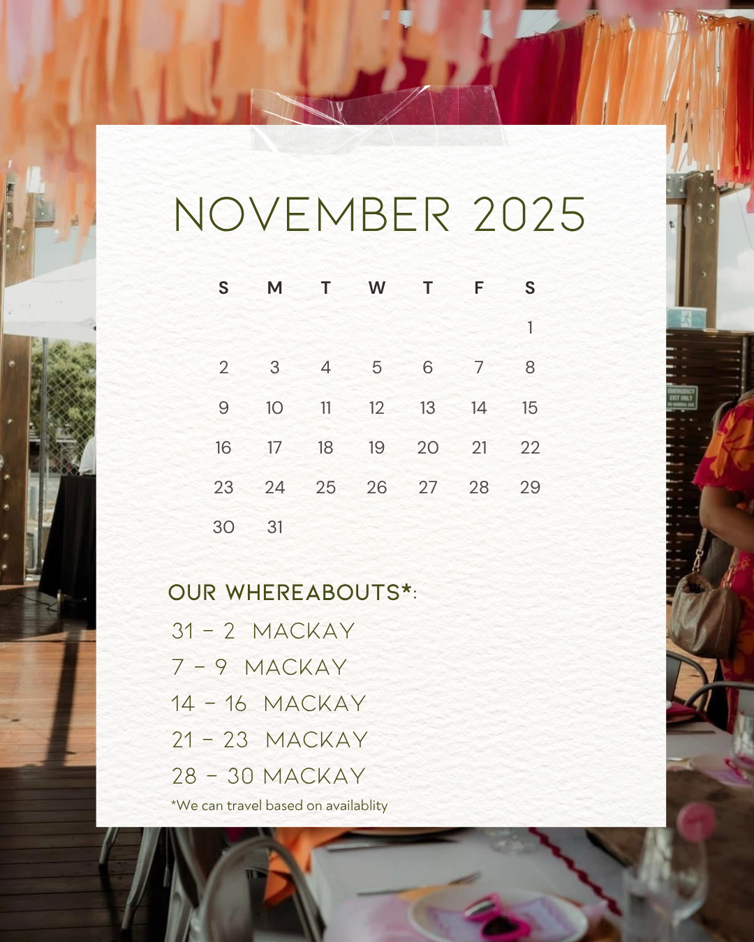 A calendar for November 2025 with marked dates for travel to Mackay. The background shows a decorated outdoor setting with hanging orange and pink paper decorations, tables, and a person in colorful attire.