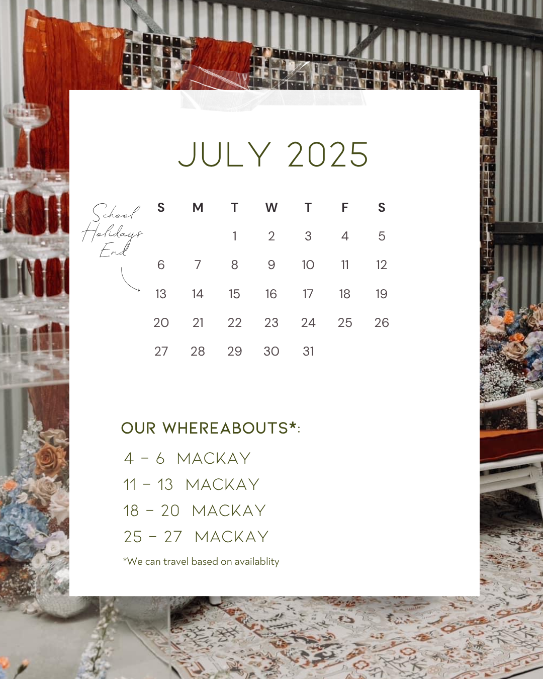 A July 2025 calendar overlay on a photo of a rustic decor setting with a chandelier, flowers, and fabric backgrounds.
