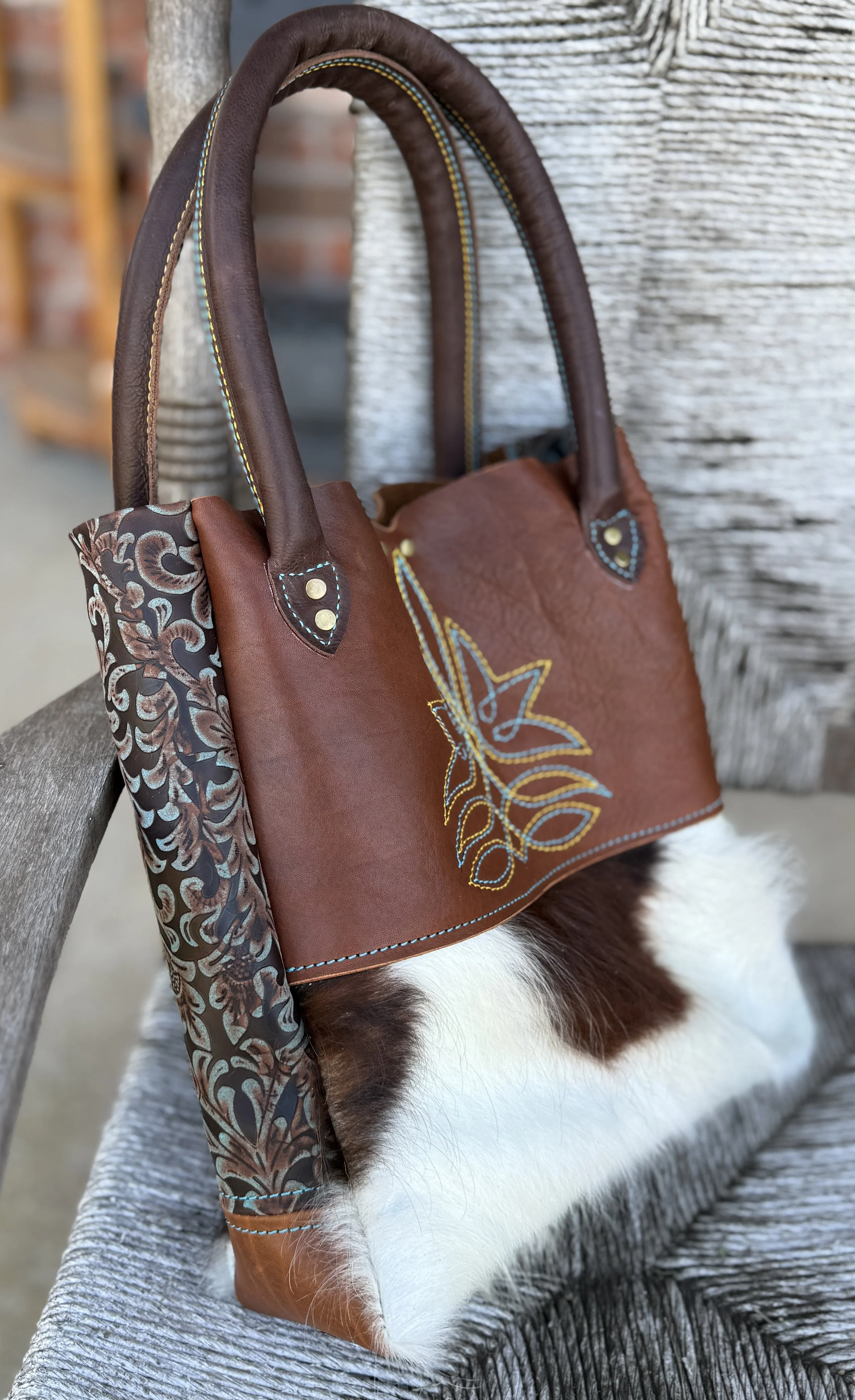 Boot stitch hair on hide purse