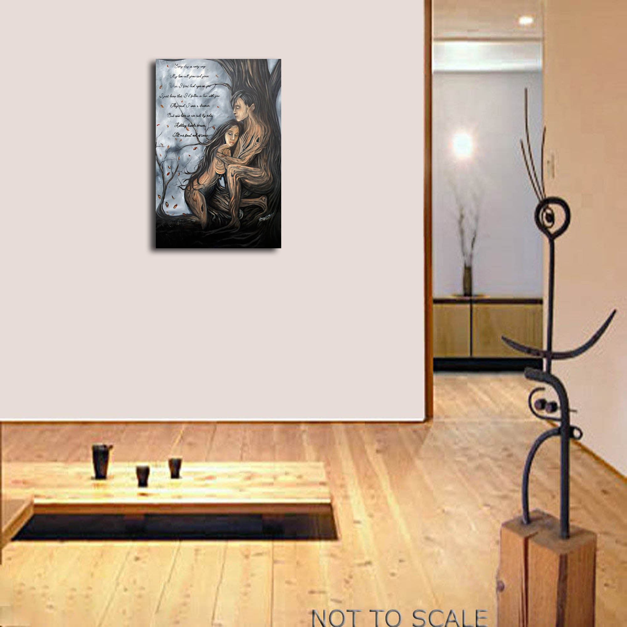 Tree man and woman growing with the tree and embracing each other. The artwork is done in black and gray with the people being flesh colored with a poem in the background behind them.
