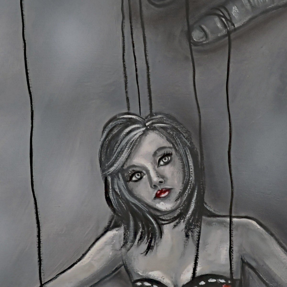 Marionette Woman Tied With Strings manipulated by hands above. Black and gray art print with one red flower lying on the ground.