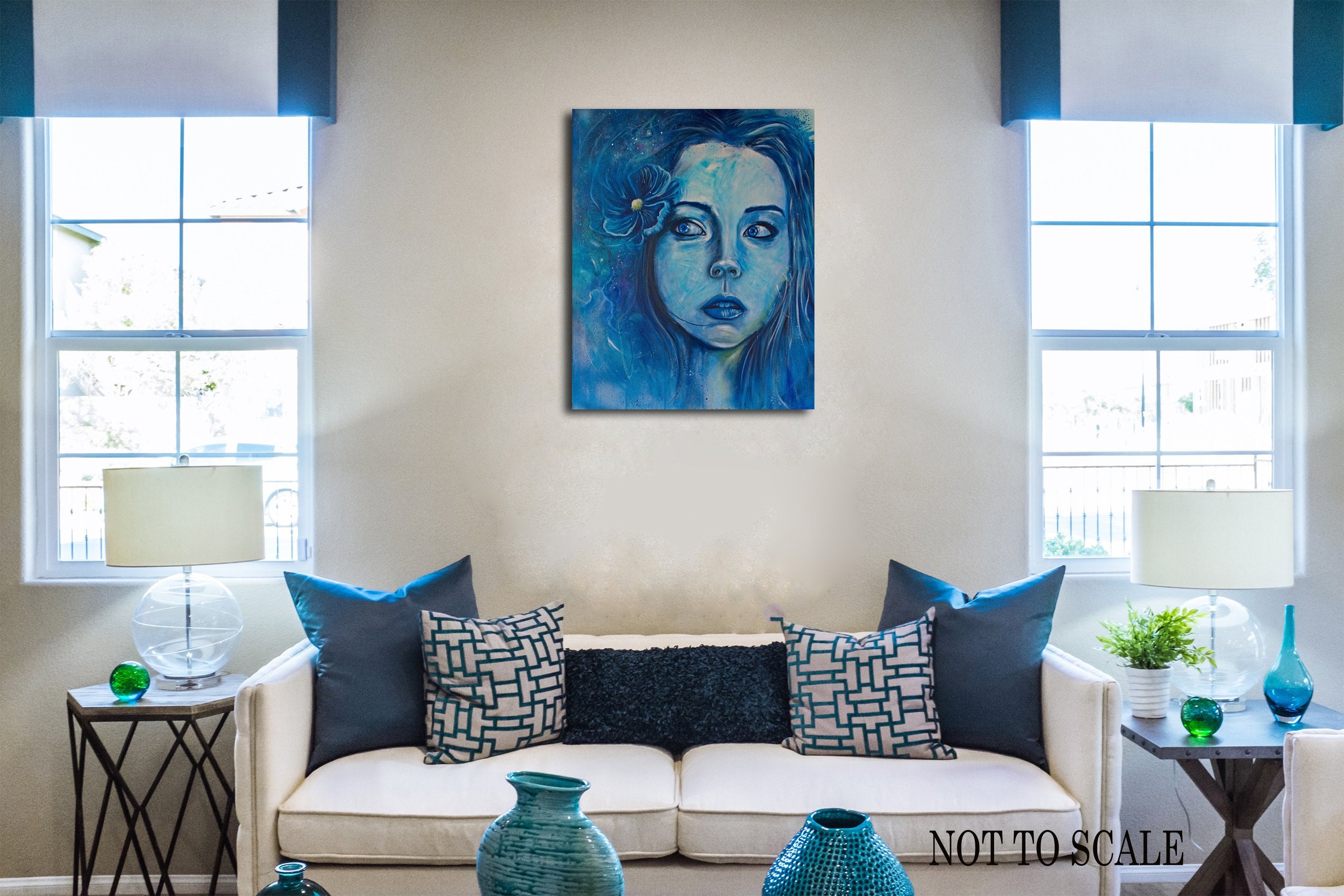 Woman's Face Portrait All in Blue. Eyes looking to the left in distrust on a wall in a room.