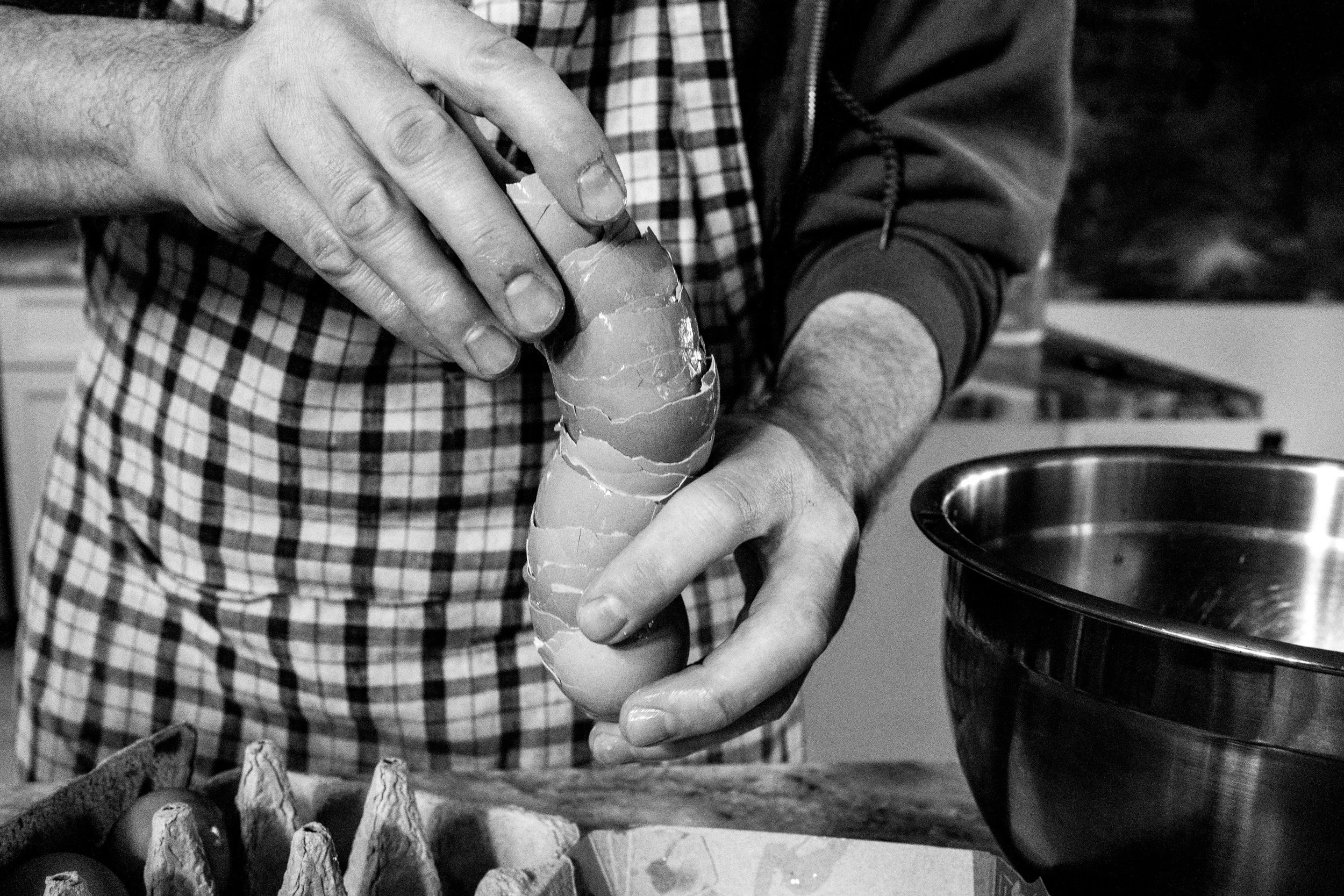 Dad baking a cake during a Tucson family photography session