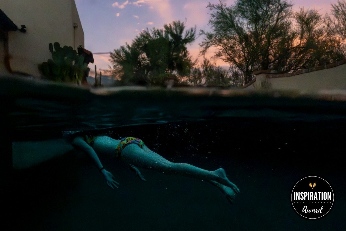 girl swimming underwater during a Tucson Family photography session.